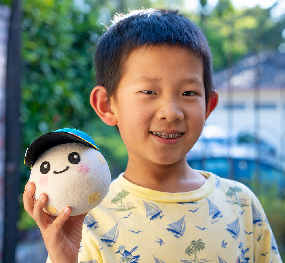 8-year-old Lucas Ye holding the plushy he designed as a zero gravity indicator for the Artemis II mission. 8-year-old Lucas Ye holding the plushy he designed as a zero gravity indicator for the Artemis II mission.